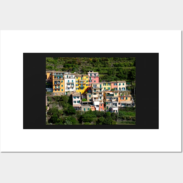 View on the cliff town of Manarola, one of the colorful Cinque Terre on the Italian west coast Wall Art by Dolfilms